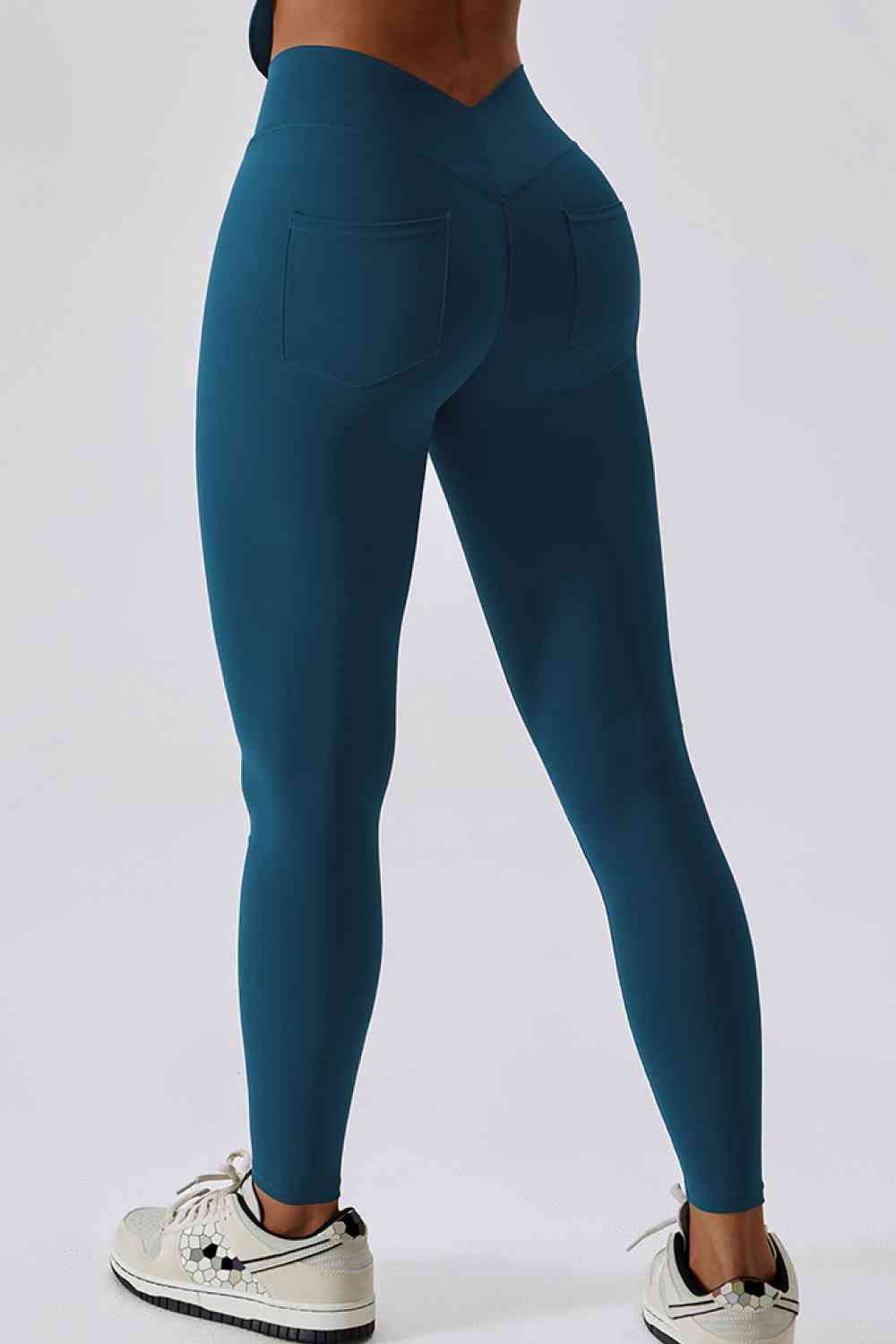 Leggings deportivos con bolsillo trasero y corte slim con cinturilla ancha