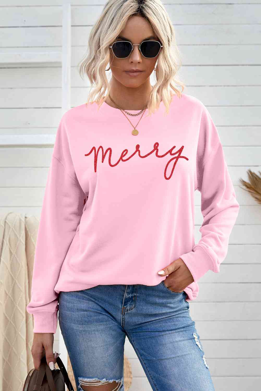 Sudadera con hombros caídos y gráfico MERRY