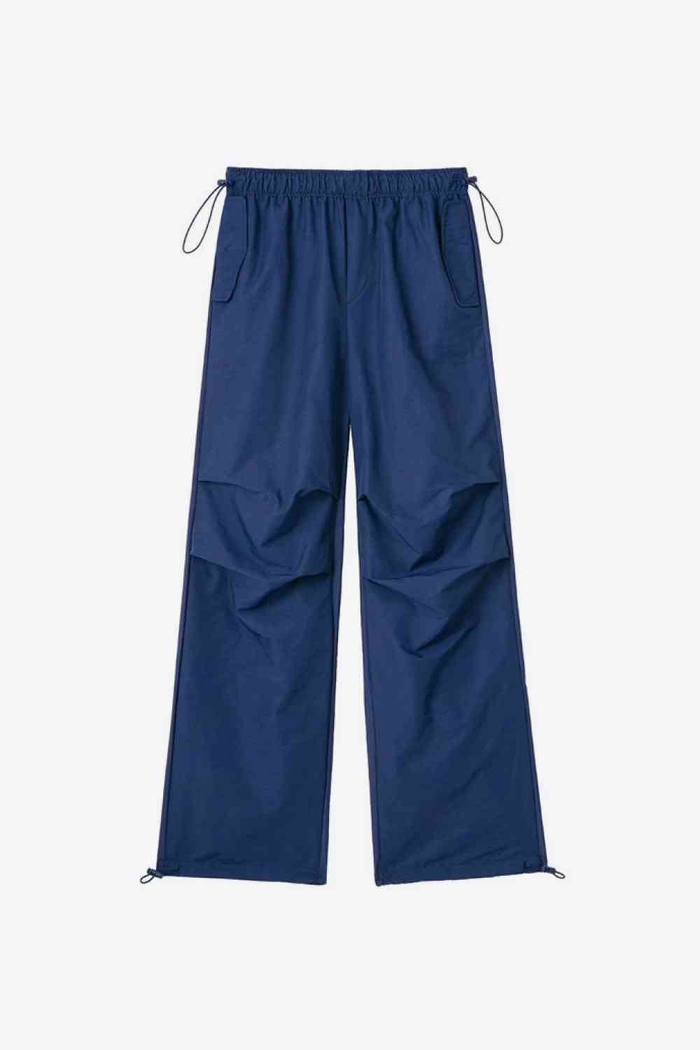 Pantalones con cordón en la cintura y bolsillos