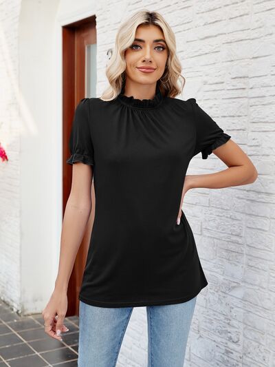 Blusa con volantes y cuello simulado