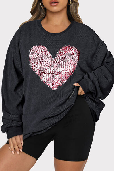 Sudadera con cuello redondo y lentejuelas con forma de corazón de talla grande