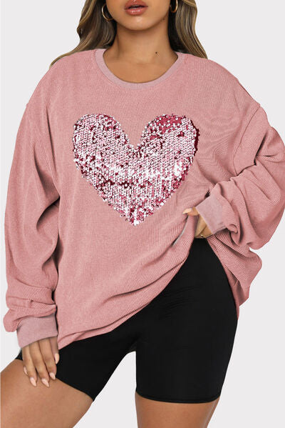 Sudadera con cuello redondo y lentejuelas con forma de corazón de talla grande