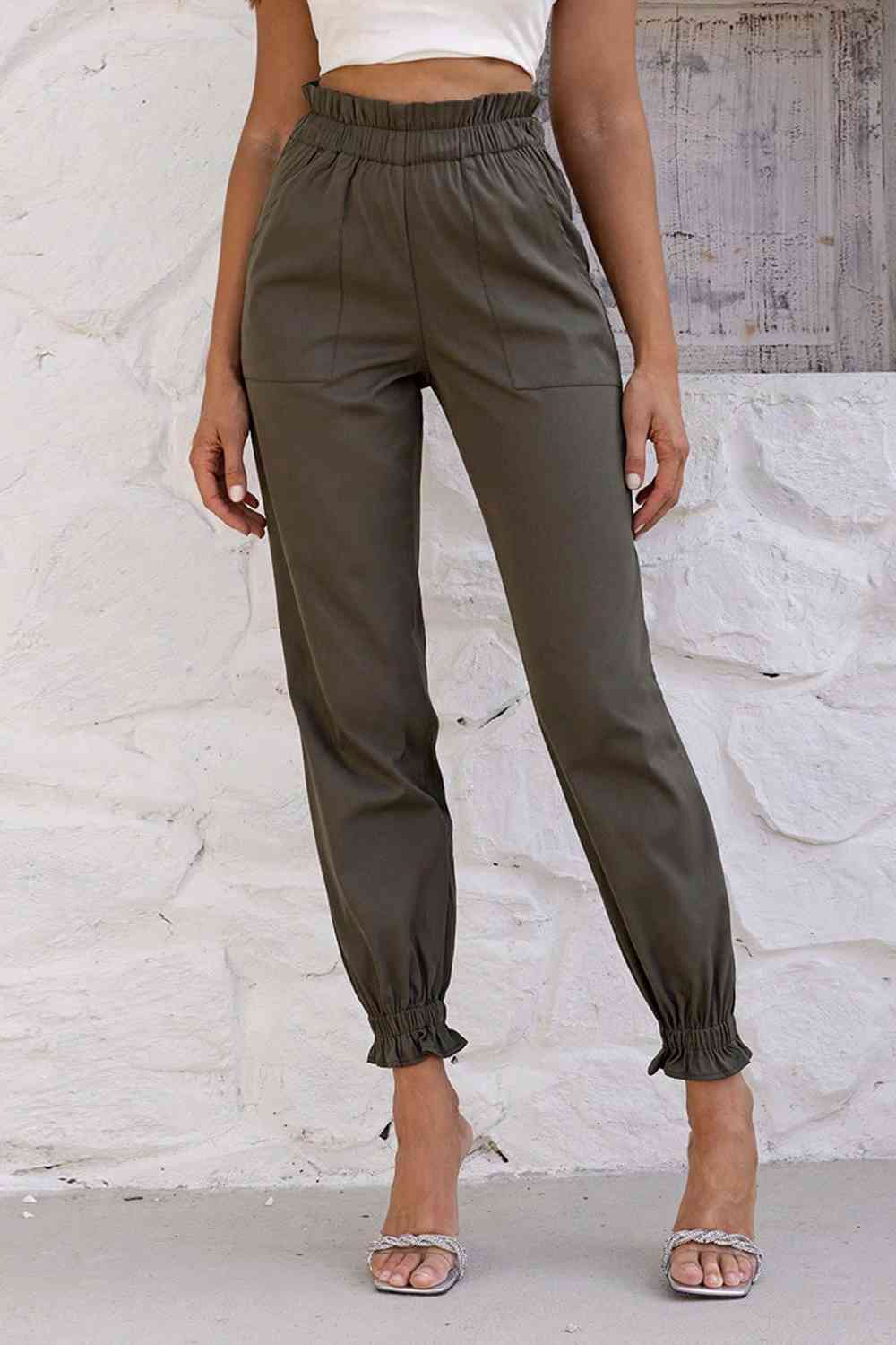 Pantalones con cintura paperbag y bolsillos