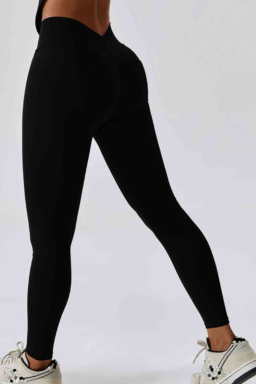 Leggings deportivos con bolsillo trasero y corte slim con cinturilla ancha