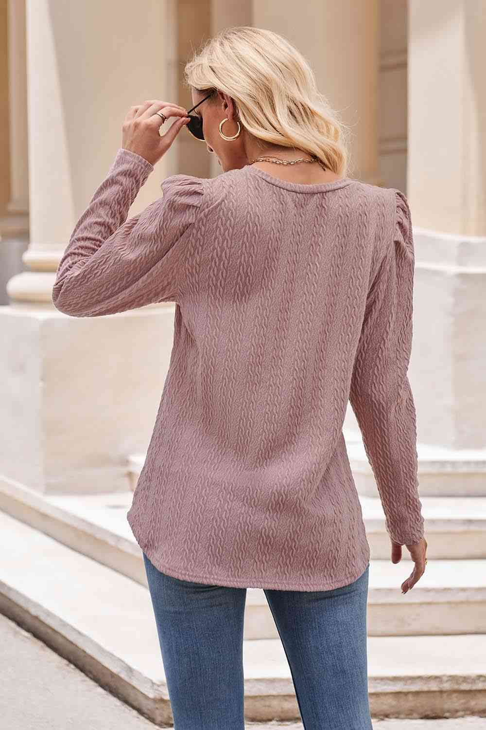 Blusa con cuello redondo y manga abullonada