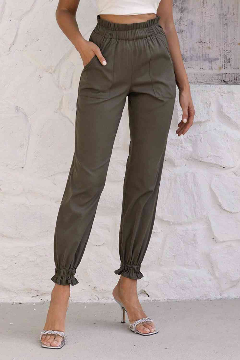 Pantalones con cintura paperbag y bolsillos