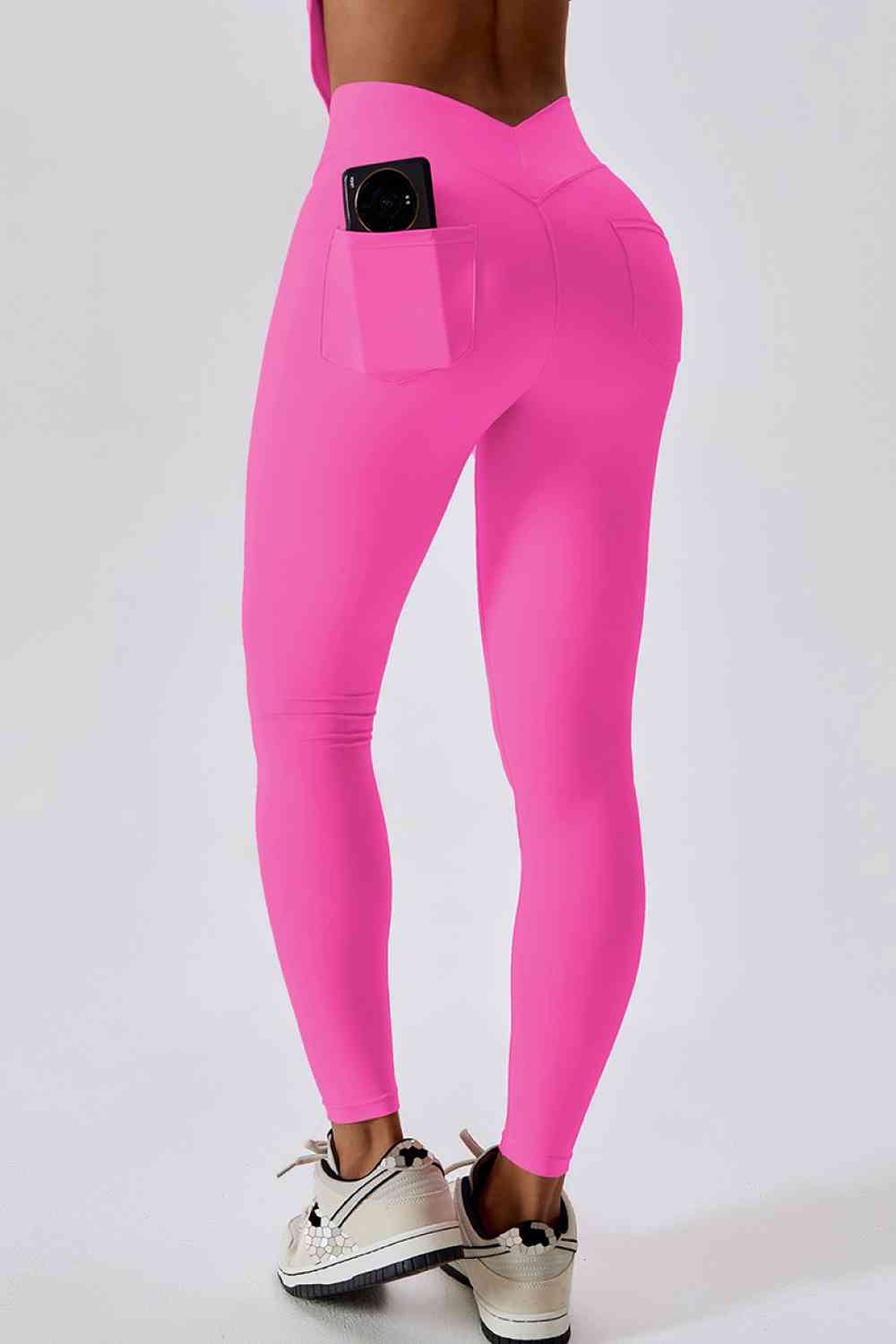 Leggings deportivos con bolsillo trasero y corte slim con cinturilla ancha