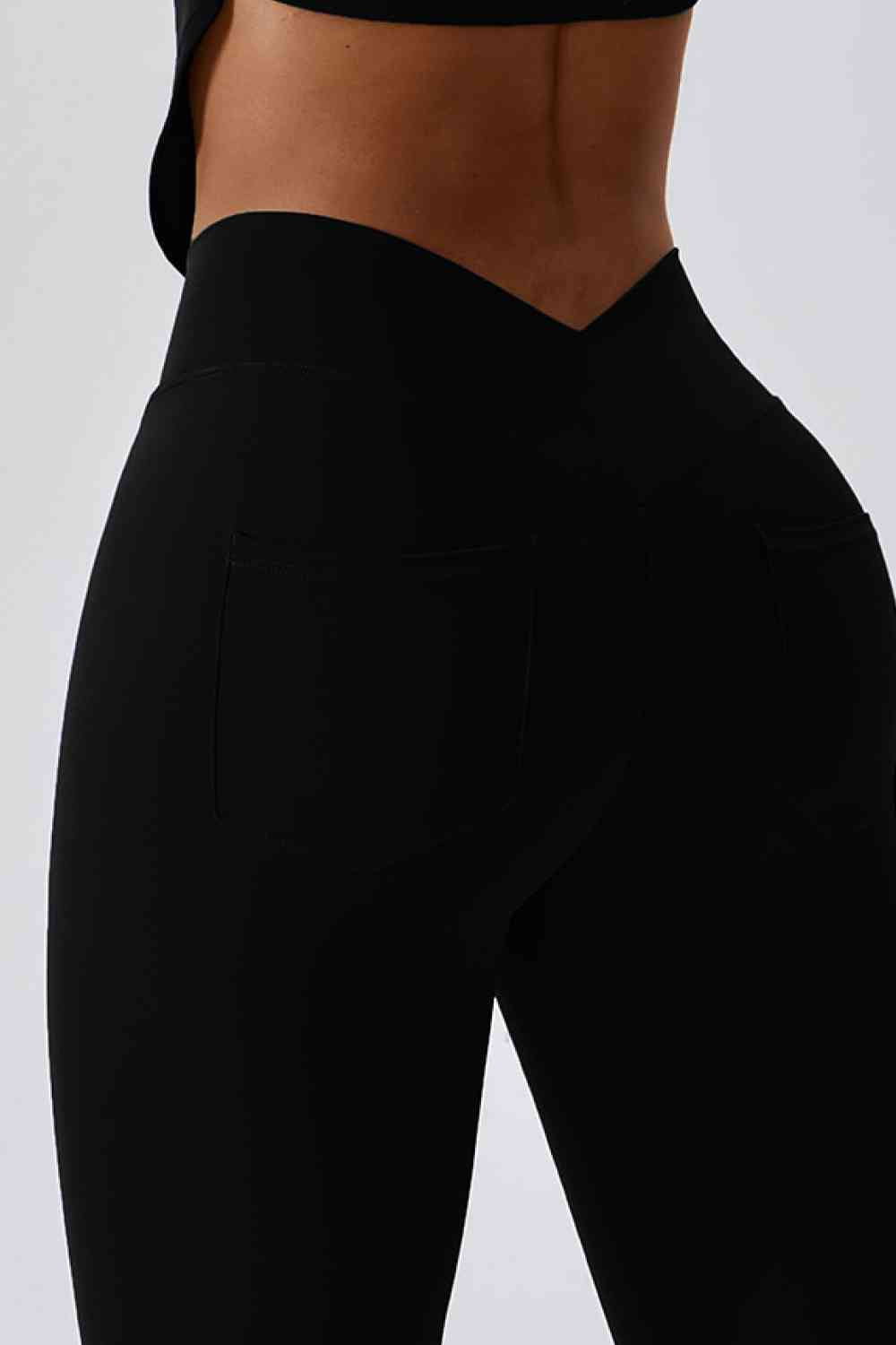 Leggings deportivos con bolsillo trasero y corte slim con cinturilla ancha