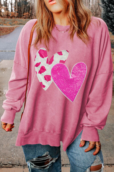 Sudadera con cuello redondo y lentejuelas con forma de corazón de talla grande