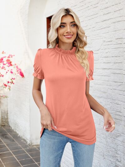 Blusa con volantes y cuello simulado