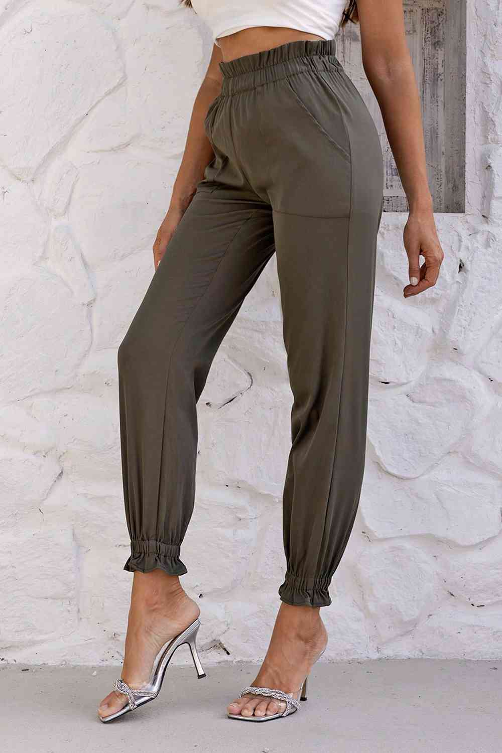 Pantalones con cintura paperbag y bolsillos