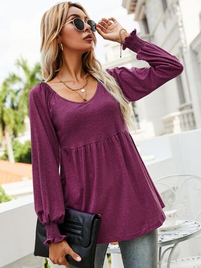 Blusa con mangas farol y cuello en V