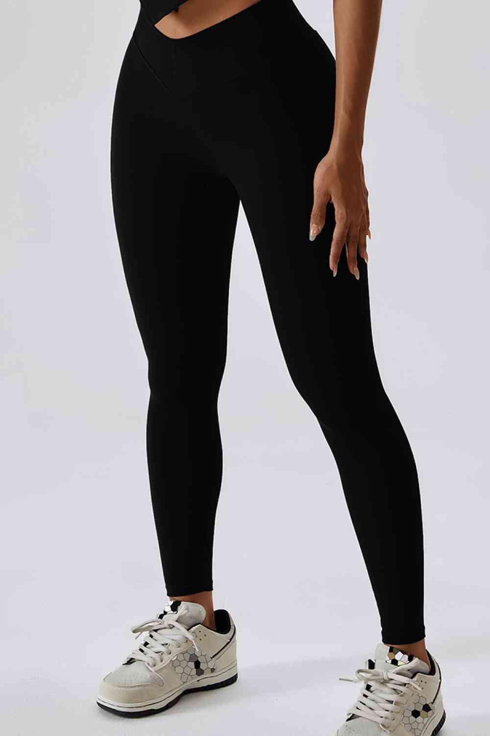 Leggings deportivos con bolsillo trasero y corte slim con cinturilla ancha